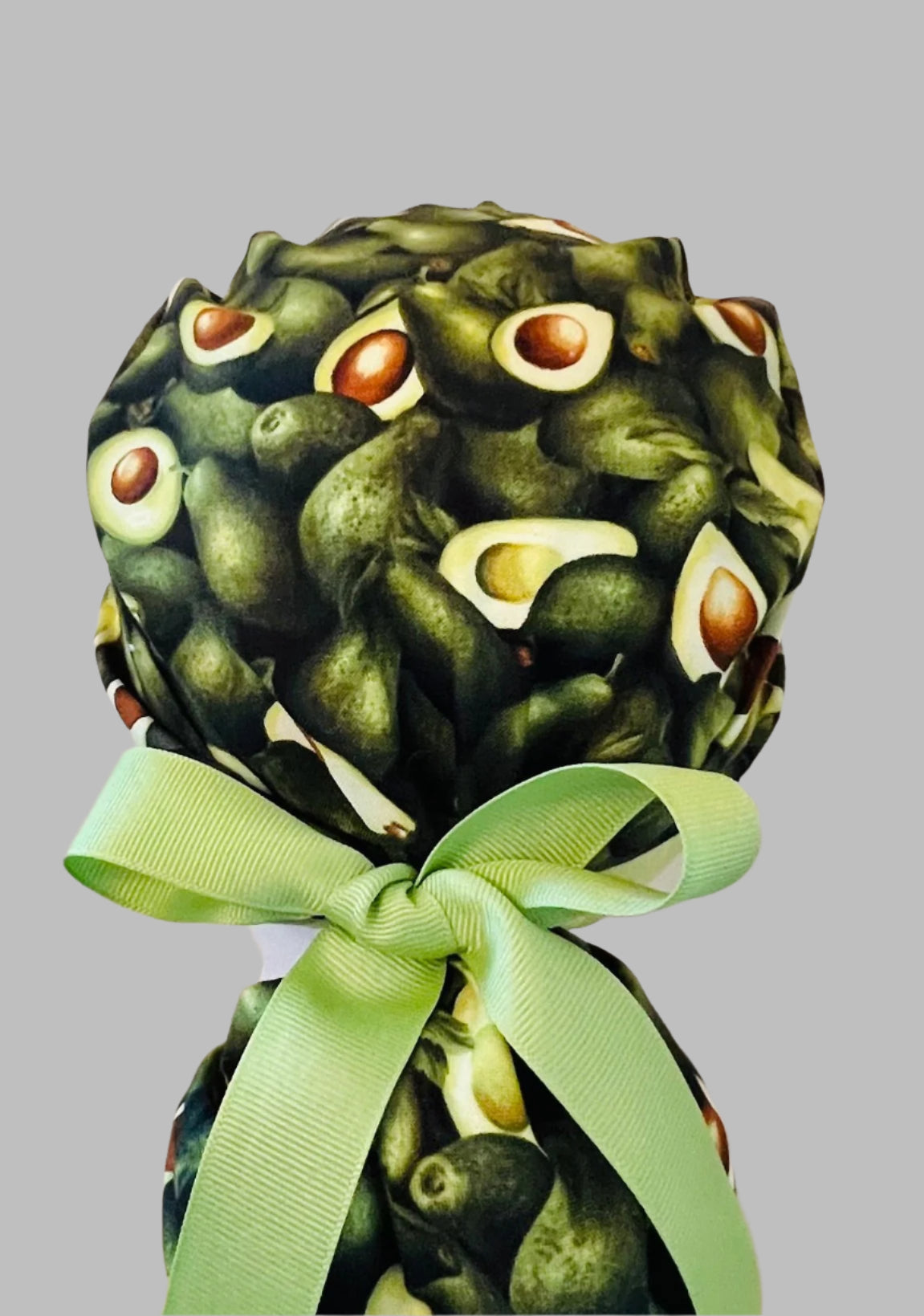 ponytail surgical scrub hat with green avocados - back