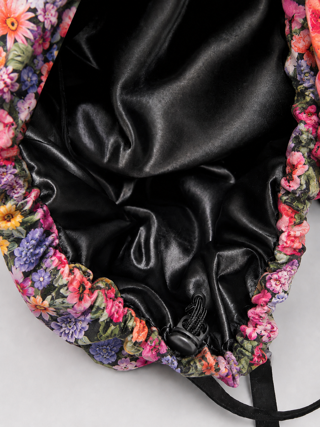 Black satin lining inside floral scrub cap close up view luxurious satin lined surgical hat for natural hair braids locs and curls nurses and healthcare professionals handmade OR World USA