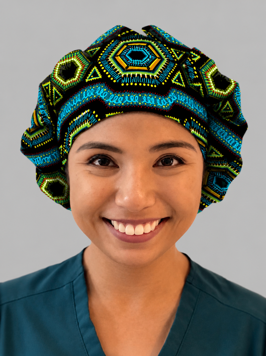 Nurse wearing Colorful Spirit African print bouffant scrub cap black background teal green gold geometric pattern surgical hat handmade OR World