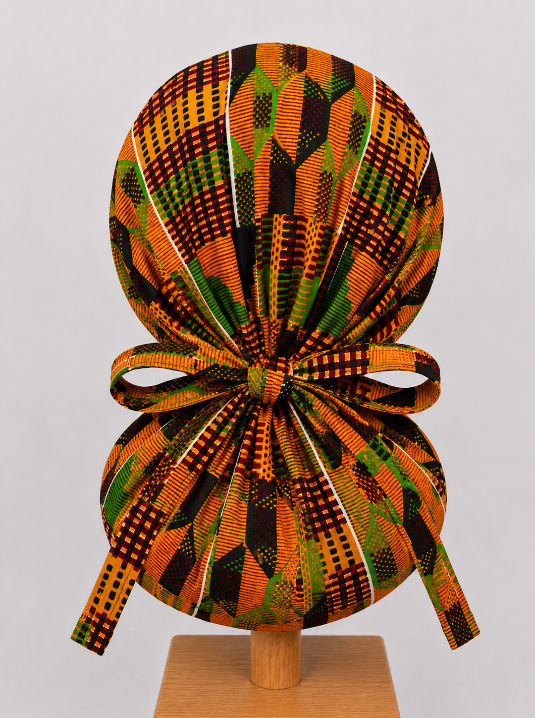 Orange green African Kente print XL ponytail scrub cap Ghana inspired surgical hat for nurses with long braids locs and natural hair handmade OR World-back view