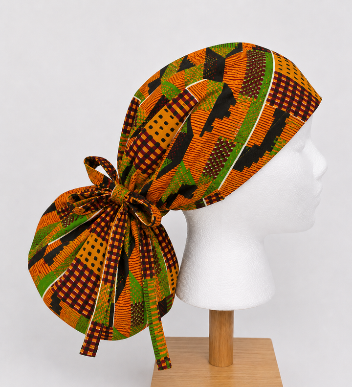 Orange green African Kente print XL ponytail scrub cap Ghana inspired surgical hat for nurses with long braids locs and natural hair handmade OR World-side view