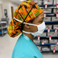 African Kente XL Ponytail Scrub Cap for Women with Satin Lining, Ghana Kente Print Surgical Hat, Adjustable Scrub Cap for Long Hair, Nurses, Surgical Techs, Doctors and Healthcare Professionals-side view