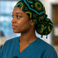 Colorful Spirit African print ponytail scrub cap side view showing ponytail pouch adjustable tie back surgical hat for nurses