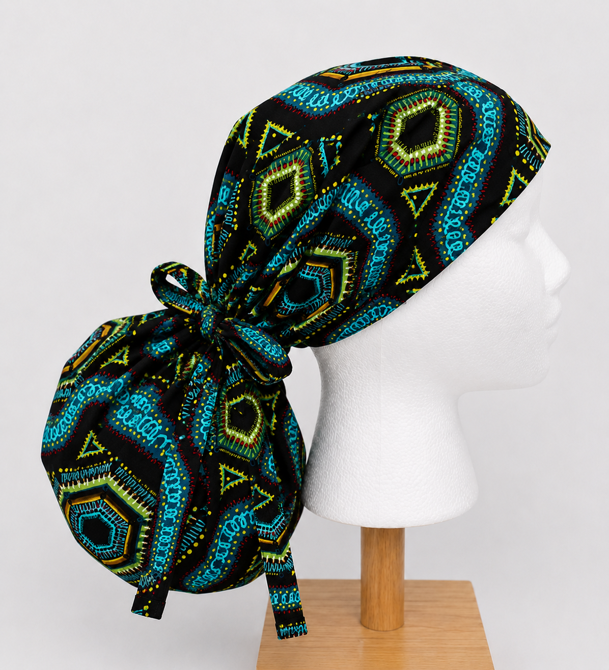 Blue African Kente Fabric XL Ponytail Scrub Cap, Women's Surgical Cap for Long Thick Hair, Handmade Ghana-Inspired Medical Hat, Satin Lining Available for Nurses, Surgeons and Healthcare Workers-side view 