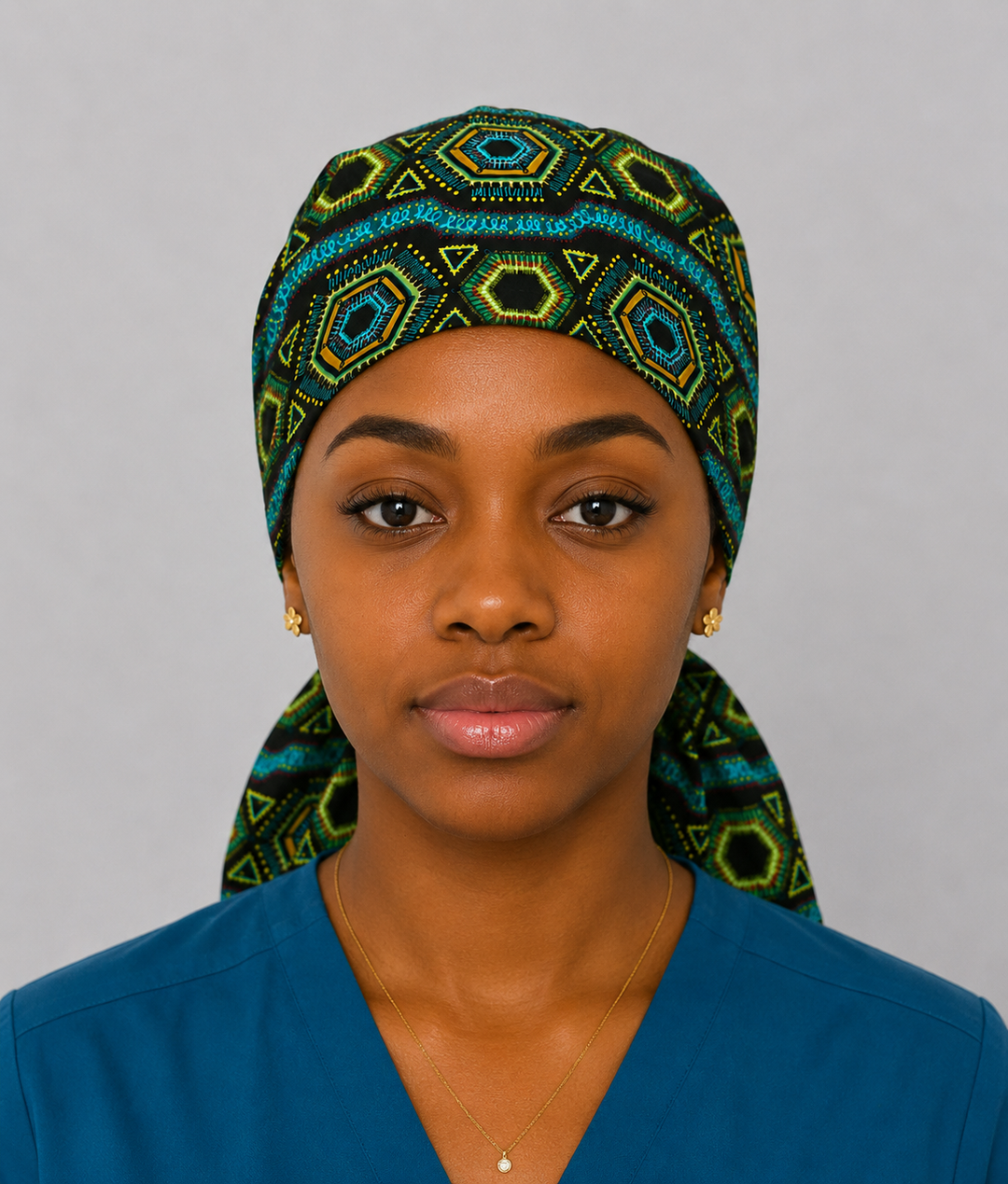 African Print Kente Ponytail Scrub Cap for Women, Blue Ghana Fabric Surgical Hat, XL Long Hair Medical Cap with Adjustable Fit and Satin Lining Available-front view with model 