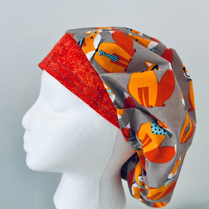 Foxy Foxes bouffant scrub cap flat side view of cute fox print, women&