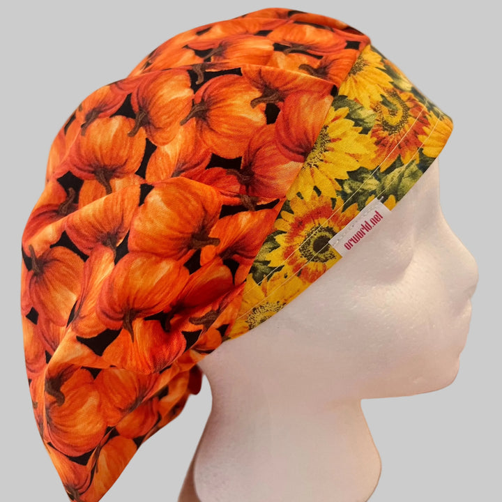 Fall pumpkin bouffant scrub cap with sunflower band, opposite side view, handmade autumn surgical hat, OR World