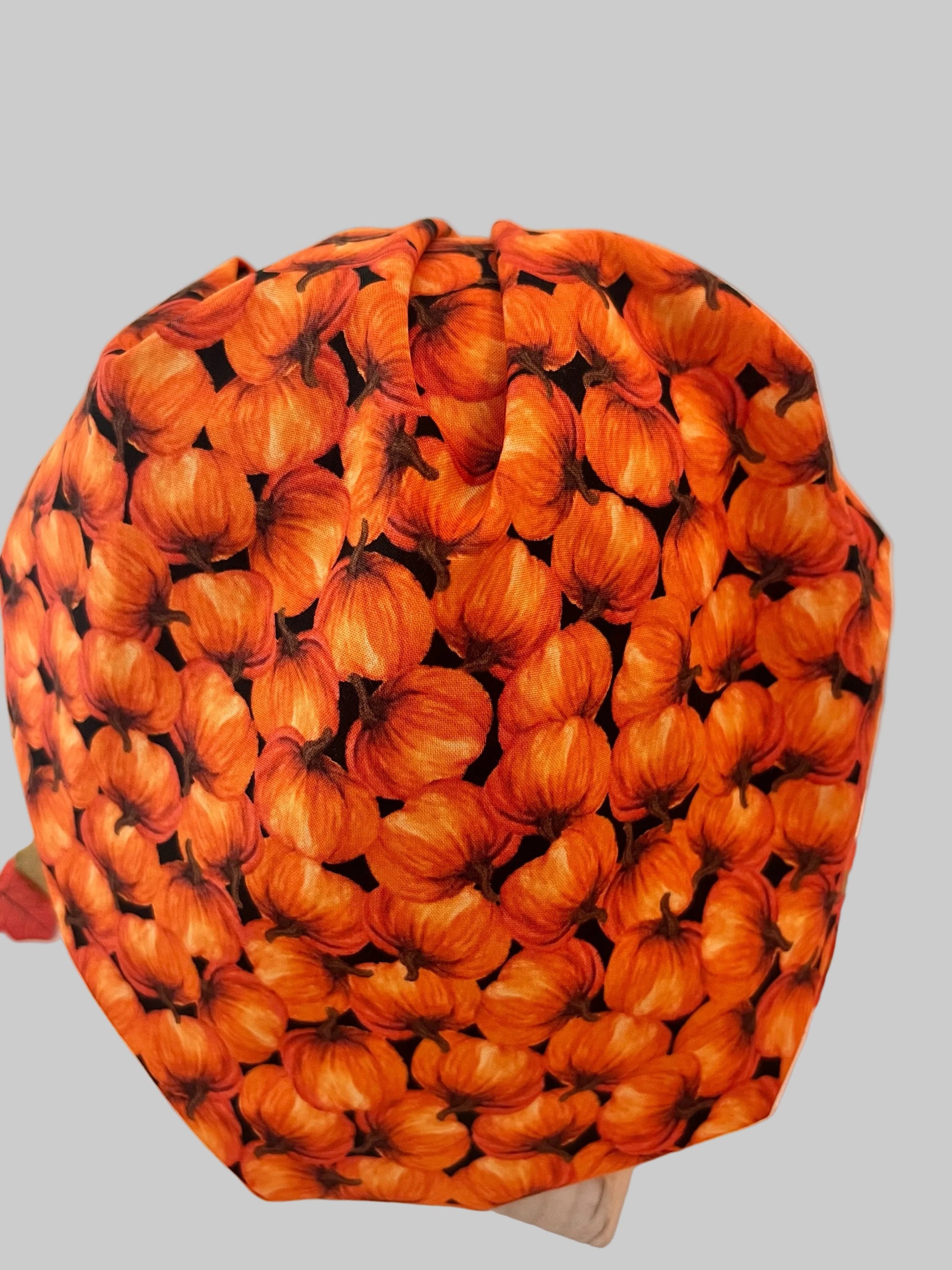 Fall pumpkin bouffant scrub cap, top and back view of orange pumpkin print, autumn OR cap, OR World