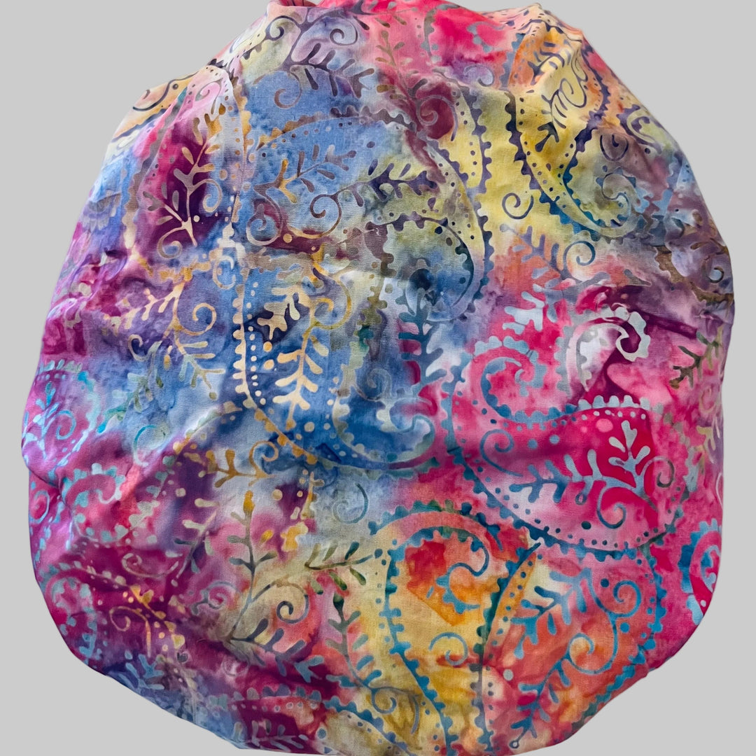 Pastel candyland batik bouffant scrub cap with fuchsia, lavender &amp; lime hues — handmade-in-USA OR World surgical hat, cheerful gift for nurses &amp; surgeons.