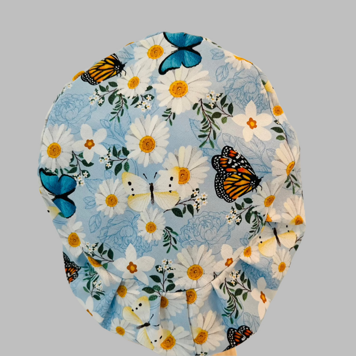 Spring Floral Butterfly Euro Scrub Cap | Daisy &amp; Blue Floral Surgical Cap | Women’s Fitted Scrub Hat | OR Cap | Adjustable Tie Back