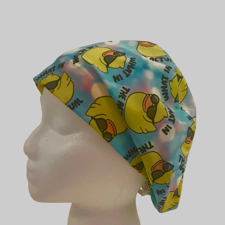 Funny Duck Euro Scrub Cap|"What in the Actual" Humor Surgical Hat for Nurses | left side view