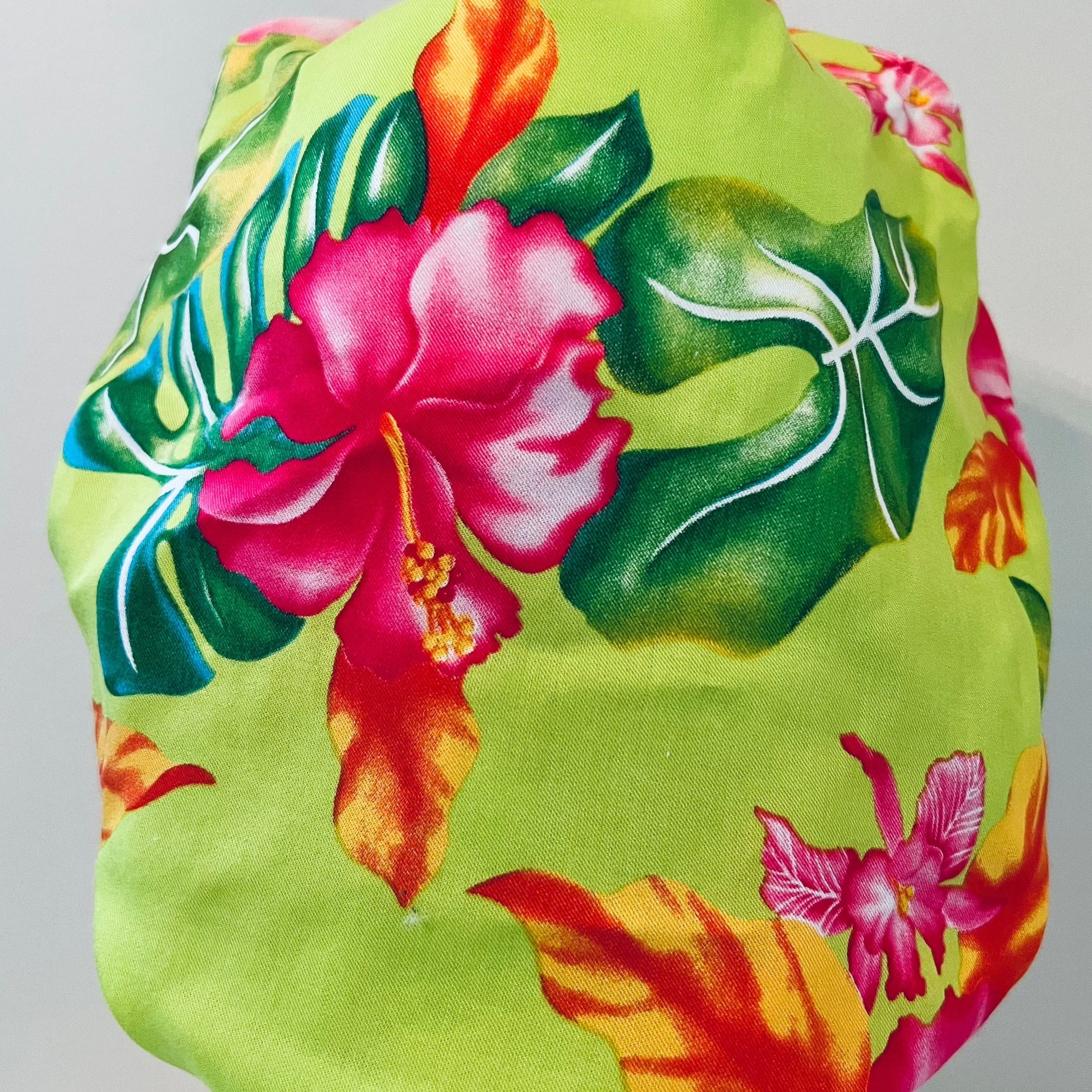 Bouffant-Hawaiian-lime green with pink Hibiscus flowers