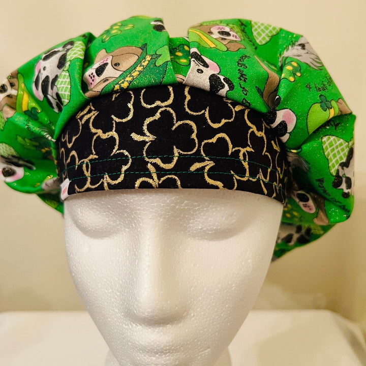 Top view of puppies &amp; gold four-leaf clover bouffant scrub cap — handmade-in-USA St. Patrick&