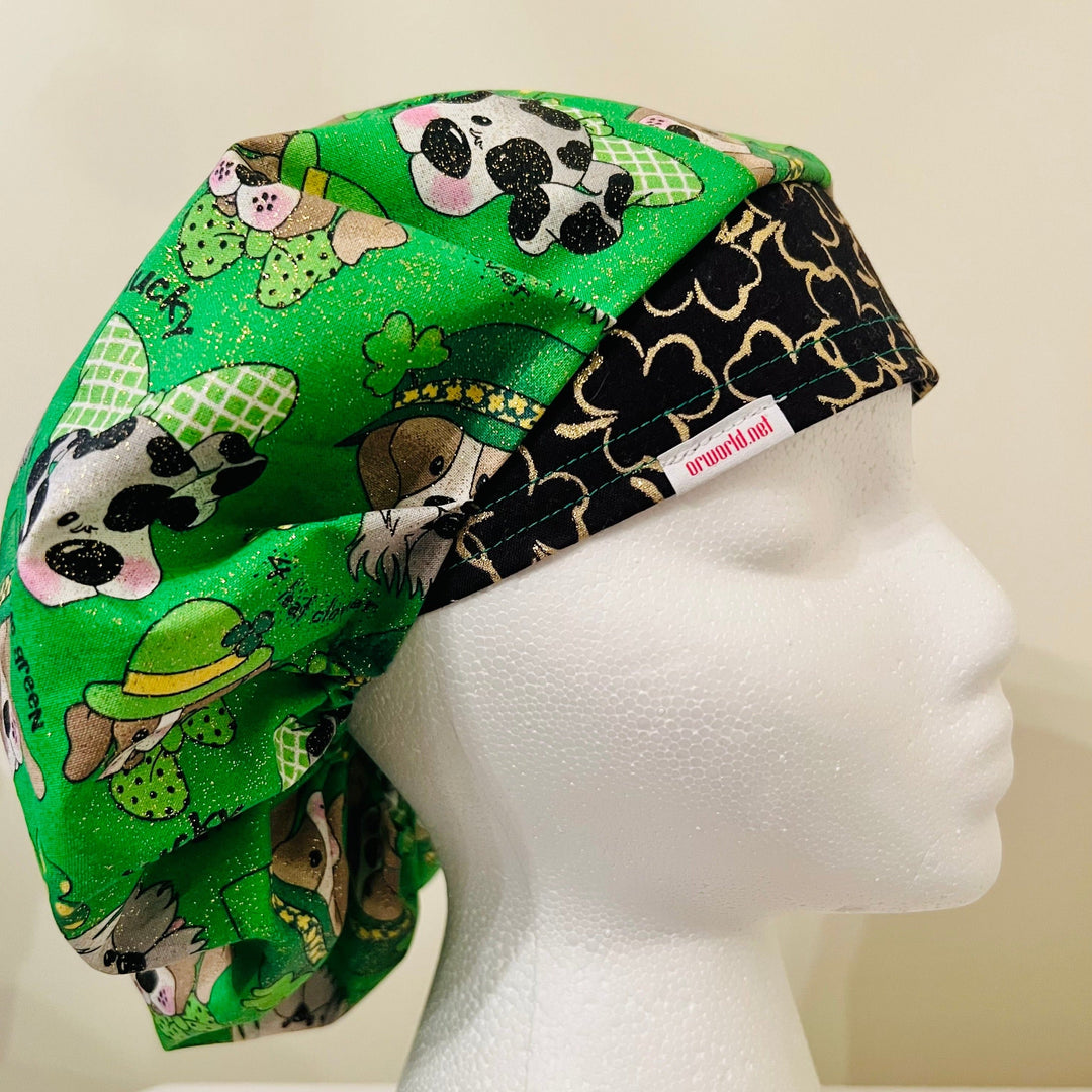 St. Patrick's Day bouffant scrub cap with festive puppies and gold four-leaf clovers on a model — handmade-in-USA surgical hat for women from OR World.