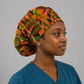 African Kente Ghana bouffant scrub cap side view 2 traditional Ghana print surgical hat adjustable fit for nurses and surgical techs handmade USA