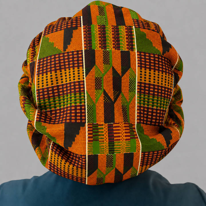 African Kente Ghana bouffant scrub cap back view traditional orange green Kente print surgical hat healthcare professionals OR World