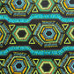 Bold African geometric print fabric close up teal blue lime green gold hexagon triangle pattern Colorful Spirit scrub cap OR World