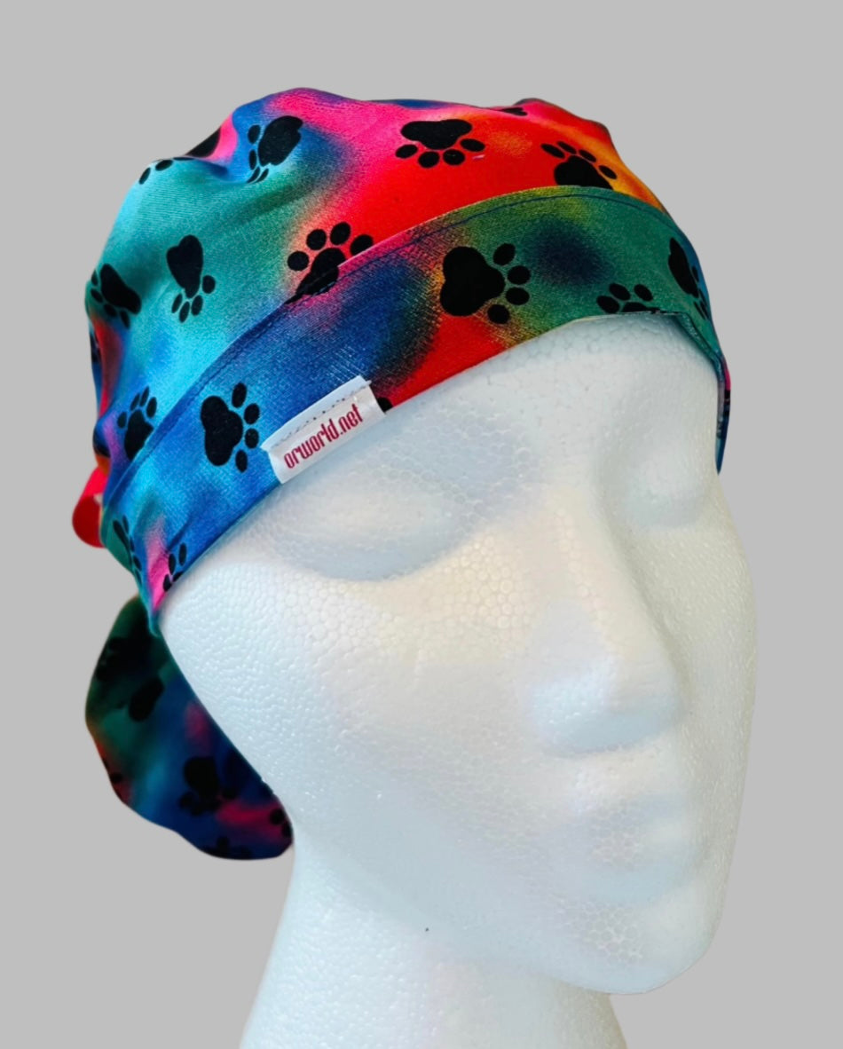 Ponytail Scrub Cap for Women | Tie Dye Puppy Paw Rainbow Surgical Hat | front view