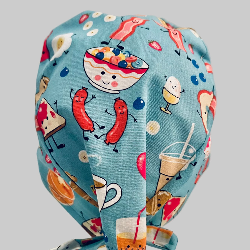 Breakfast food traditional scrub cap, top and back view, cereal sausage and toast print, OR World