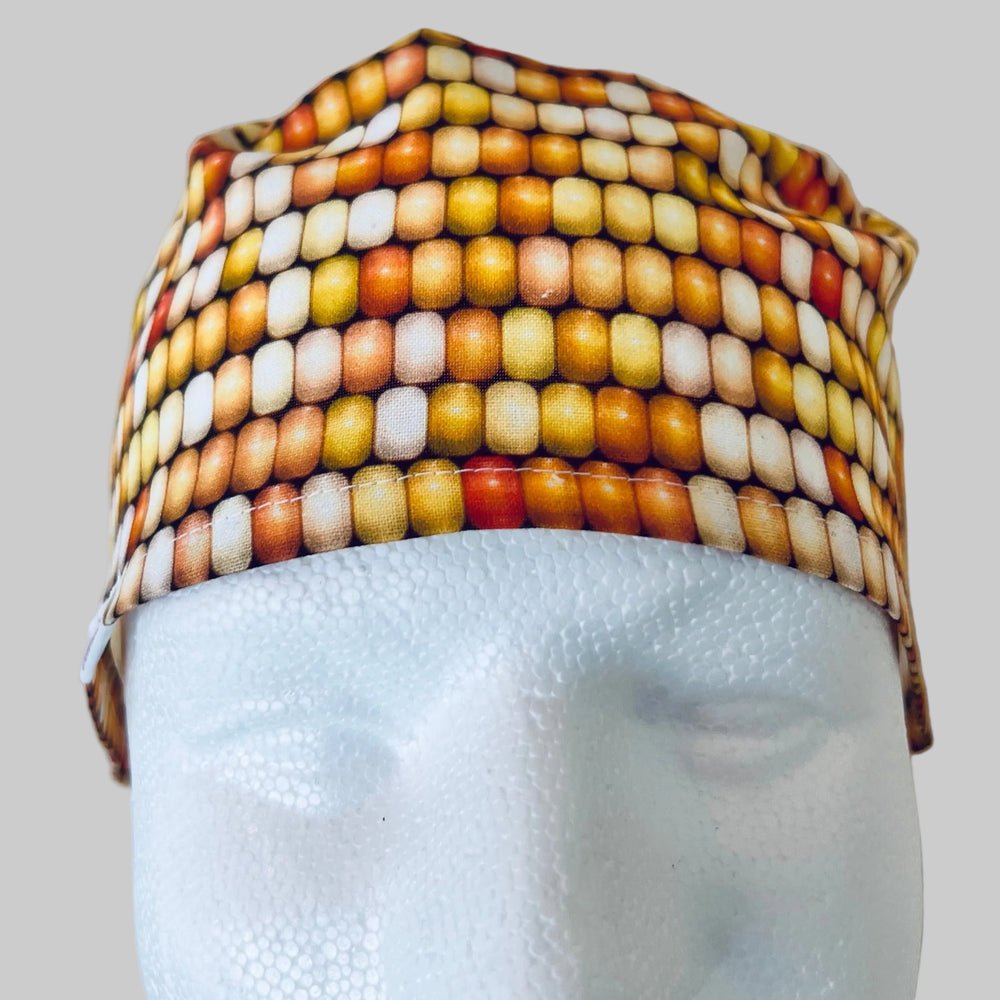 All-over yellow corn print scrub cap traditional tie-back unisex surgical hat for nurses and healthcare professionals front