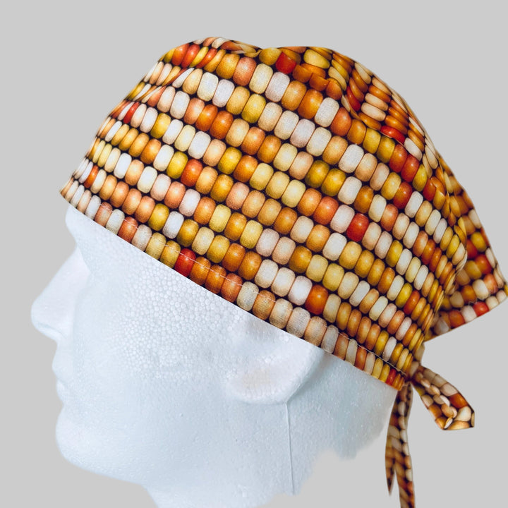 All-over yellow corn print scrub cap traditional tie-back unisex surgical hat for nurses and healthcare professionals side view