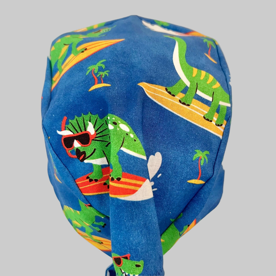 Surfing Dinosaur Scrub Cap – Beach Summer Dino Surgical Cap – Fun Tropical Medical Hat for Nurses &amp; Techs