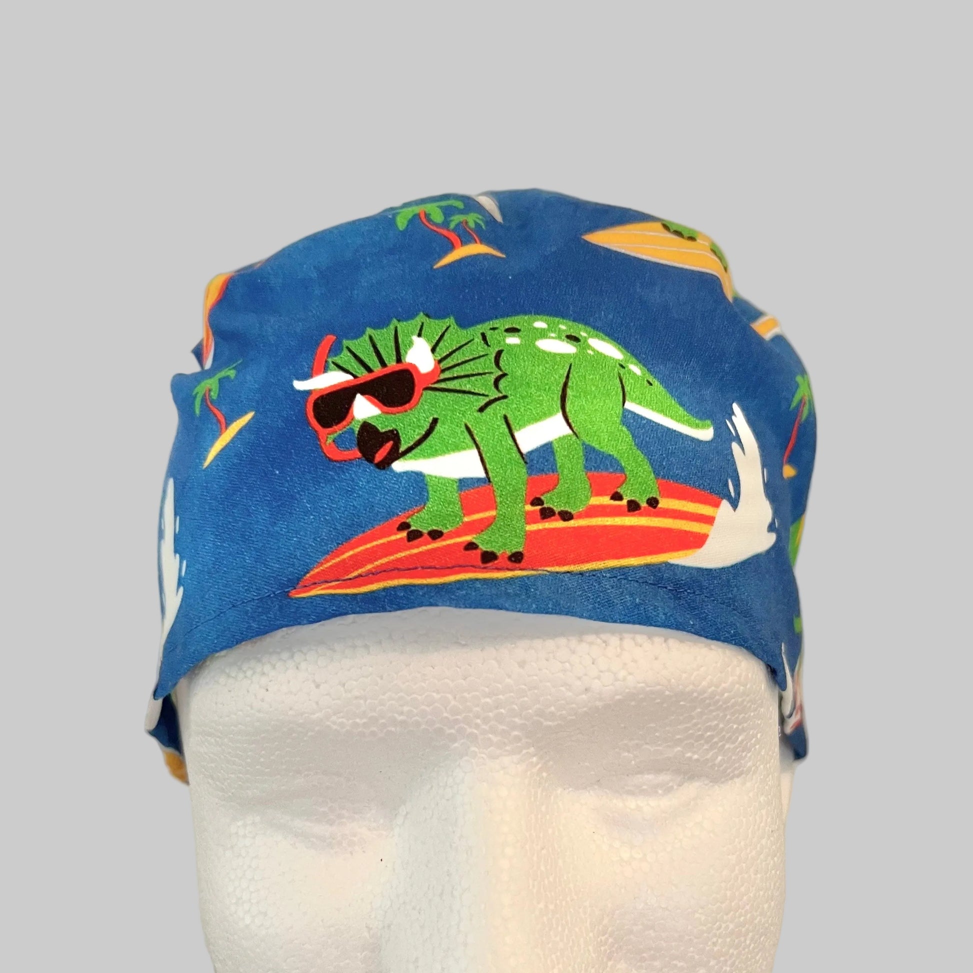Surfing Dinosaur Scrub Cap – Beach Summer Dino Surgical Cap – Fun Tropical Medical Hat for Nurses & Techs