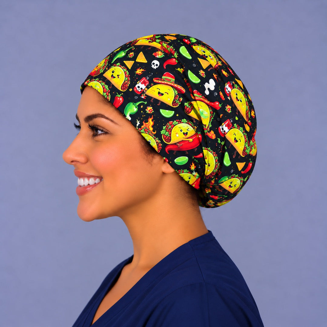 Left profile of the adjustable taco nurse scrub hat showing pouf depth for a bun and the large-scale dancing taco print
