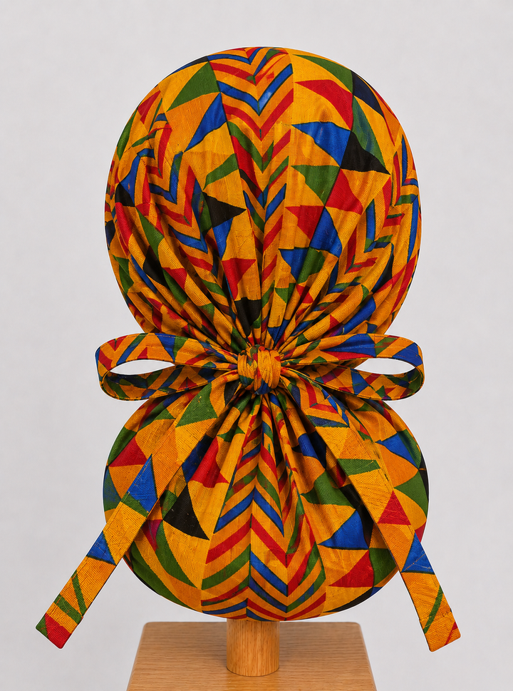 African Kente print XL ponytail scrub cap back view showing extra large hair pouch for braids locs and natural hair