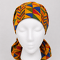 African Kente print XXL ponytail scrub cap front view gold red green geometric pattern extra large surgical hat for nurses