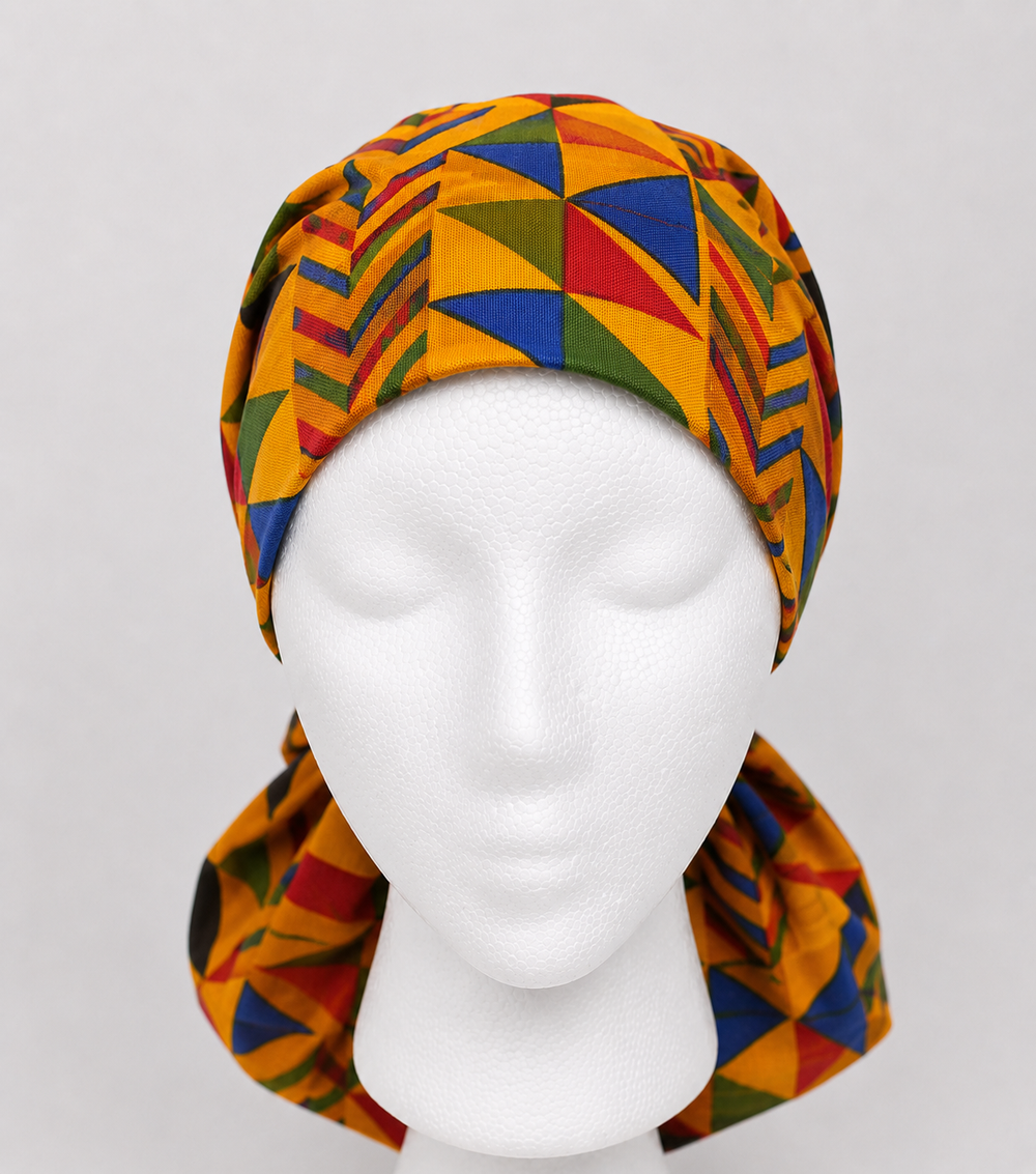African Kente print XXL ponytail scrub cap front view gold red green geometric pattern extra large surgical hat for nurses