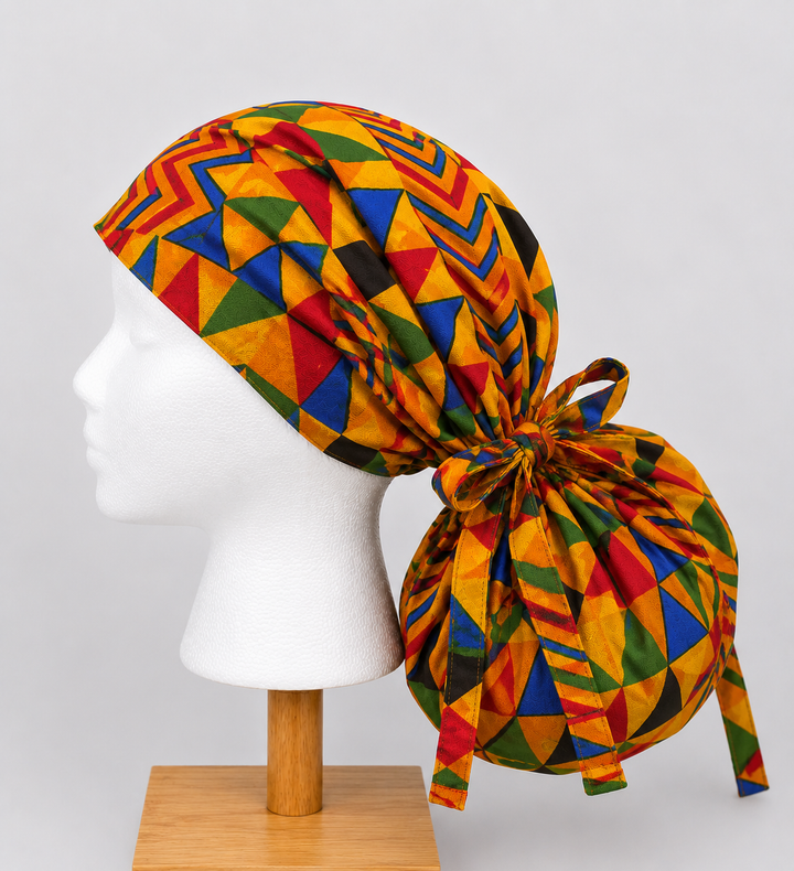 African Kente print XL ponytail scrub cap side view showing extra large hair pouch for braids locs and natural hair