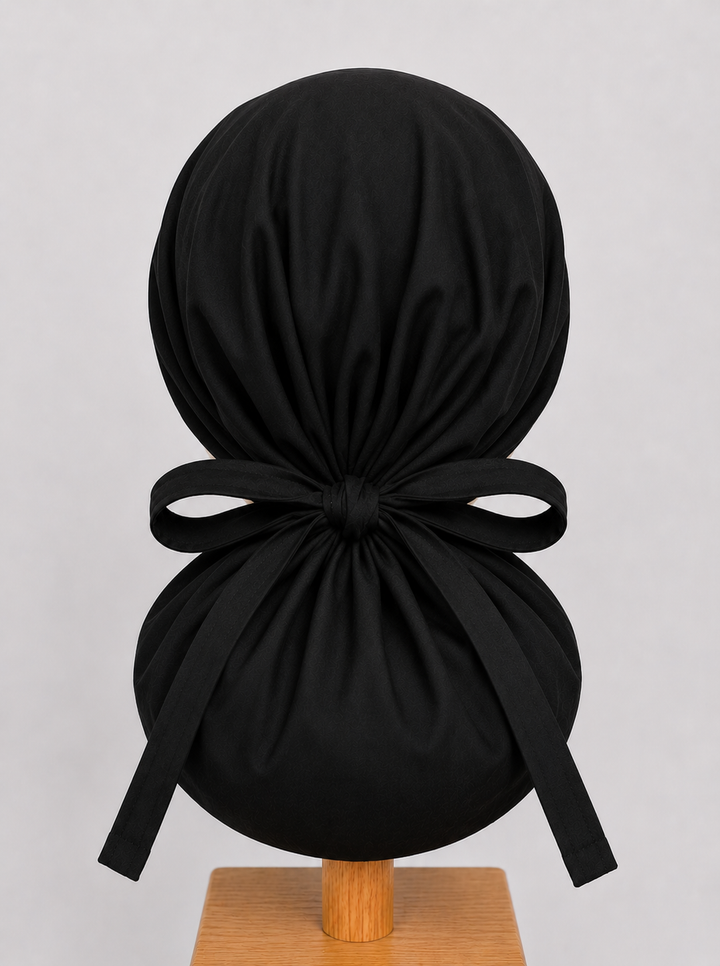 Black XL ponytail scrub cap back view showing tie closure and extra large hair pouch