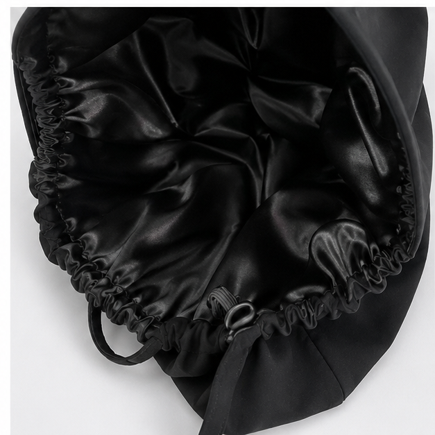 Inside view of black XXL ponytail scrub cap showing black satin lining interior