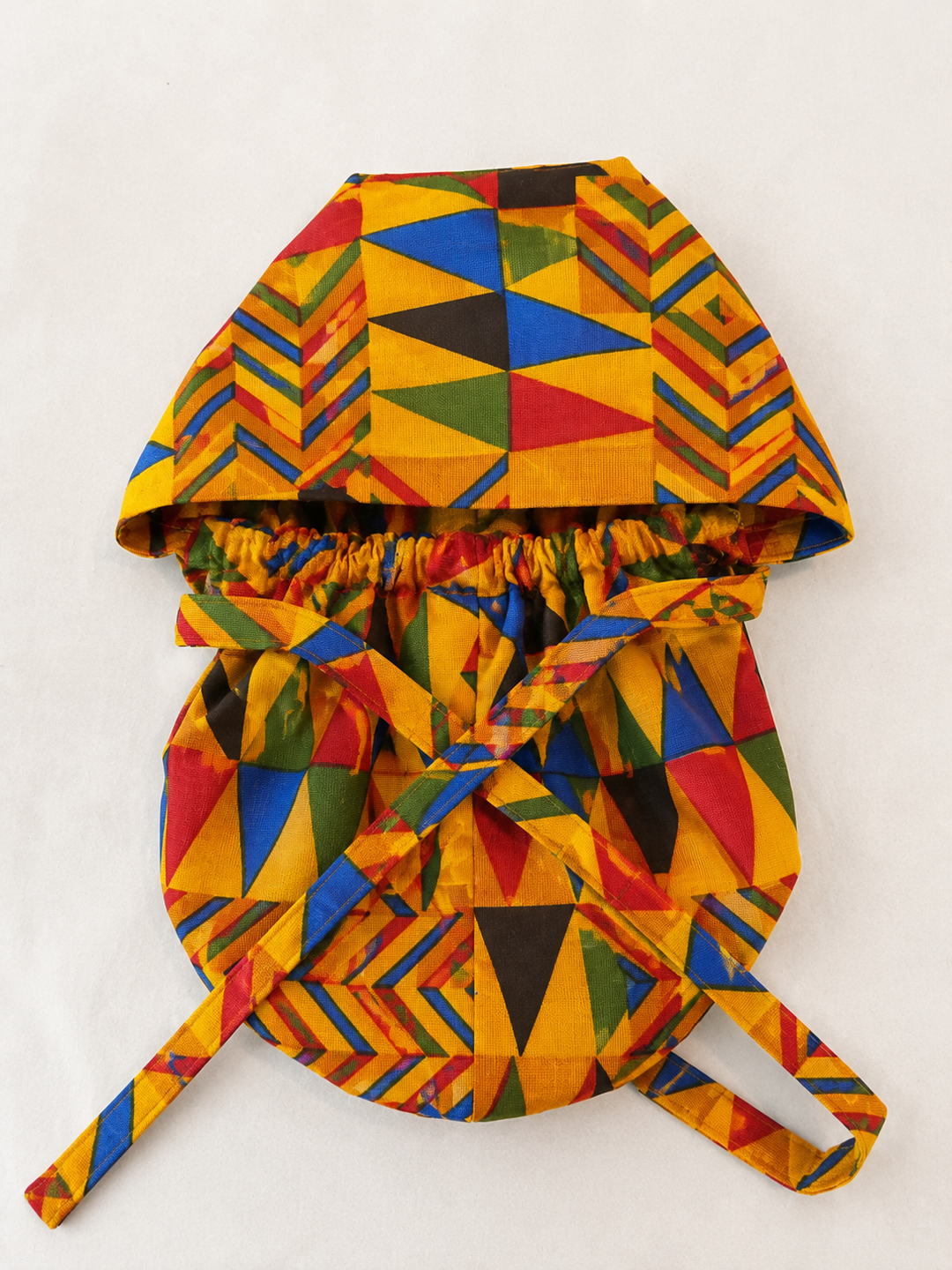 African Kente XXL ponytail scrub cap whole view showing extra extra large hair pouch for jumbo locs long braids and thick natural hair