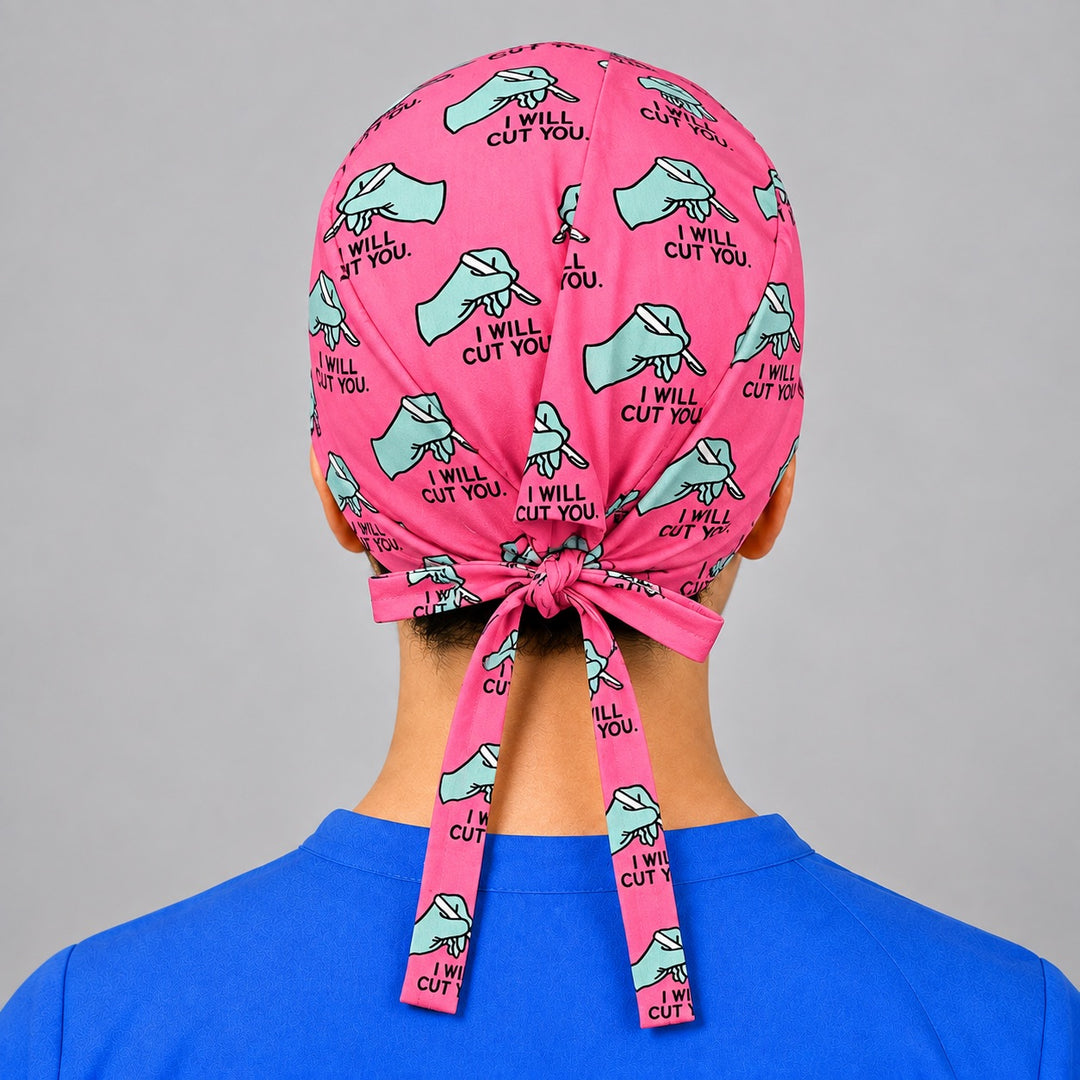 Rear detail of adjustable tie back closure on pink funny surgeon scrub hat, fits short hair and all head sizes