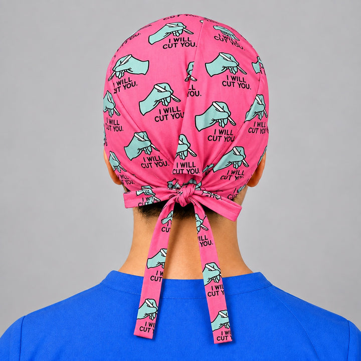 Rear detail of adjustable tie back closure on pink funny surgeon scrub hat, fits short hair and all head sizes