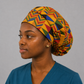 Colorful Geometric African Kente bouffant scrub cap right side view adjustable fit bold Ghana triangle Kente pattern surgical hat nurses and surgical techs