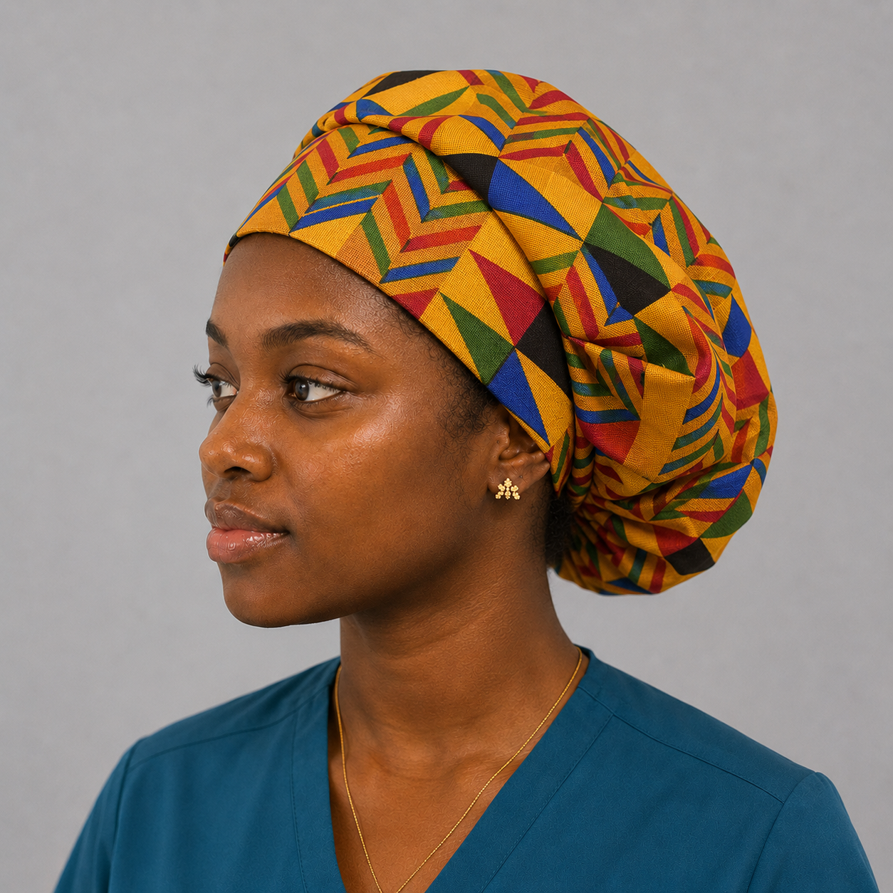 Colorful Geometric African Kente bouffant scrub cap right side view adjustable fit bold Ghana triangle Kente pattern surgical hat nurses and surgical techs