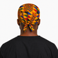 Colorful Geometric African Kente mens tieback scrub cap back view showing tie closure bold gold blue red green Ghana Kente print surgical hat handmade USA
