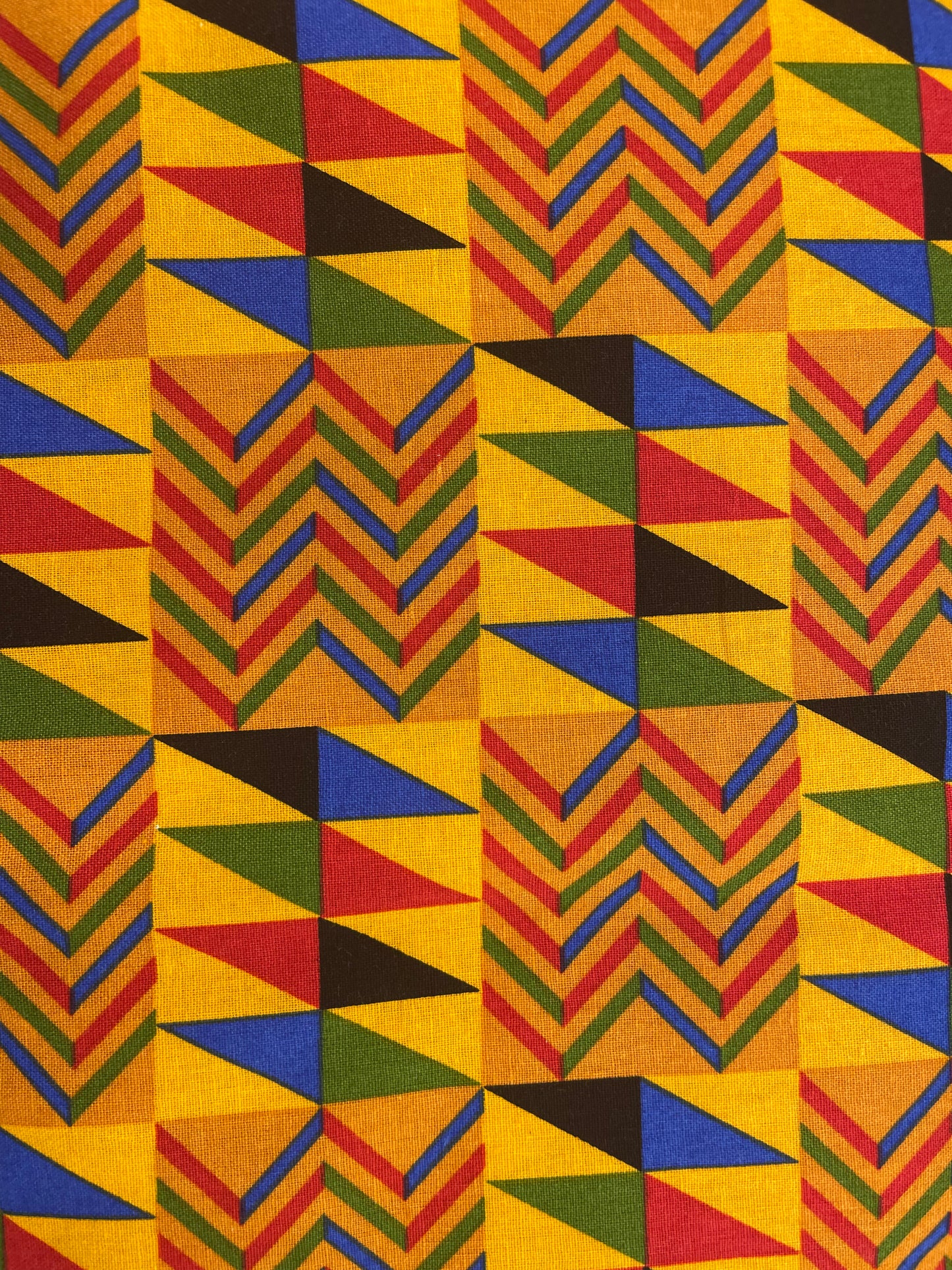 Colorful Geometric African Kente fabric swatch close up bold gold blue red green black triangle Ghana pattern handmade ponytail scrub cap OR World