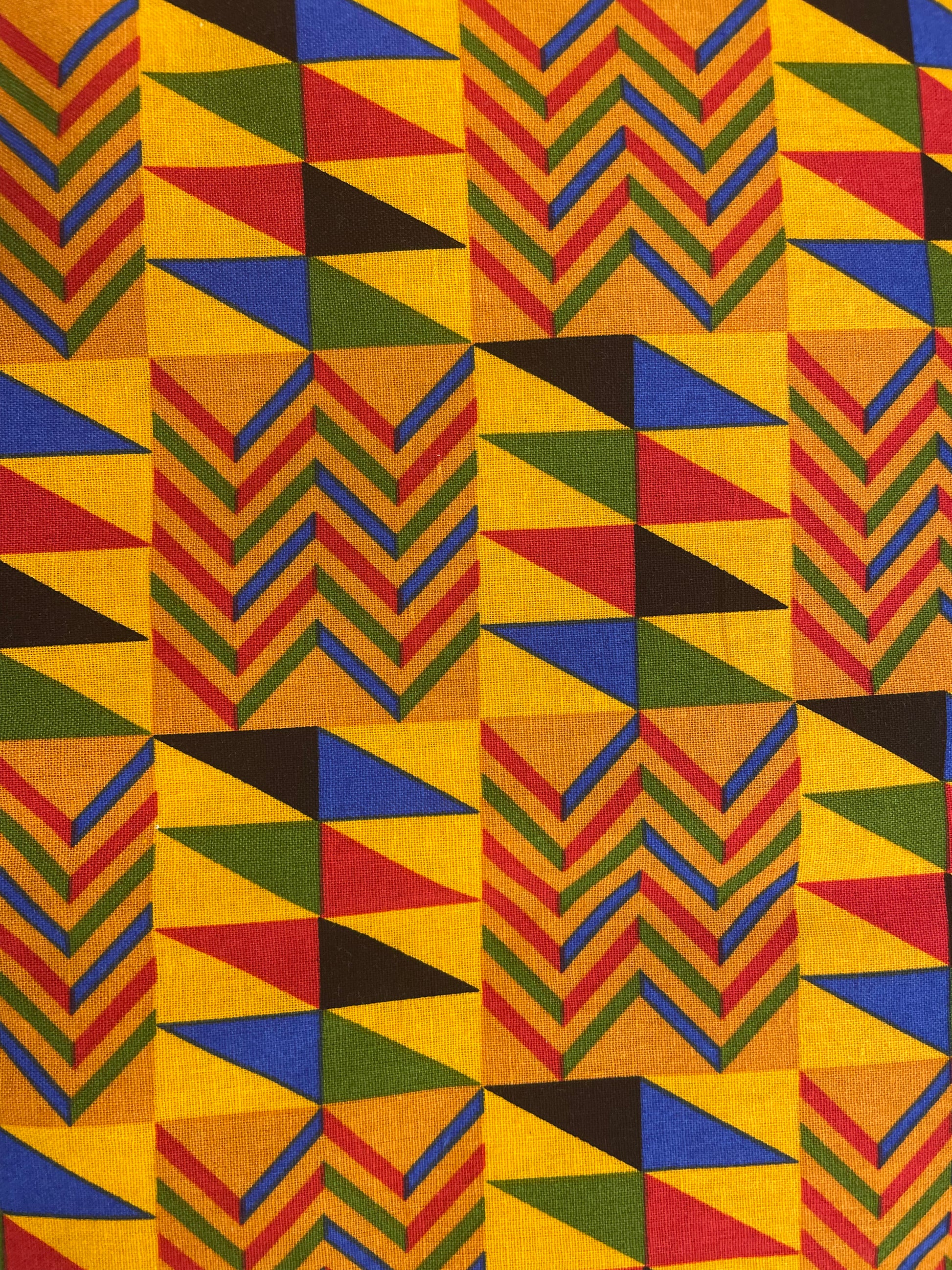 Colorful Geometric African Kente fabric swatch close up bold gold blue red green black triangle Ghana pattern handmade ponytail scrub cap OR World