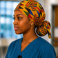 Colorful Geometric African Kente ponytail scrub cap left side view bold gold blue red green black triangle Ghana pattern surgical hat nurses healthcare professionals