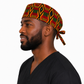Empowered Energy African Kente mens tieback scrub cap left side view traditional Ghana diamond pattern gold red green black geometric surgical hat male nurses