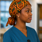 Empowered Energy African Kente ponytail scrub cap right side view adjustable tie back traditional Ghana Kente diamond pattern surgical hat nurses surgical techs