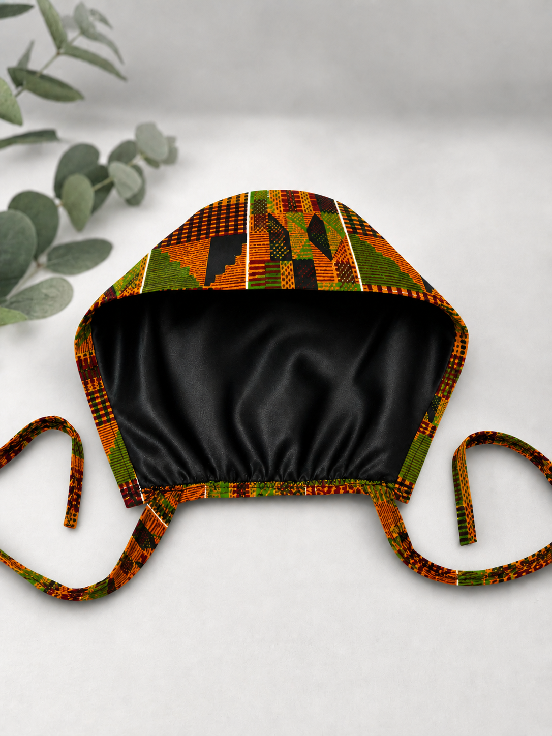 African Kente Ghana men's tieback scrub cap interior showing black satin lining for hair protection waves locs and natural hair OR World