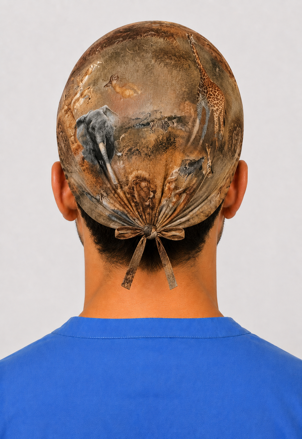 Side view of man in African safari tie-back scrub cap with giraffes &amp; zebras — handmade USA men&
