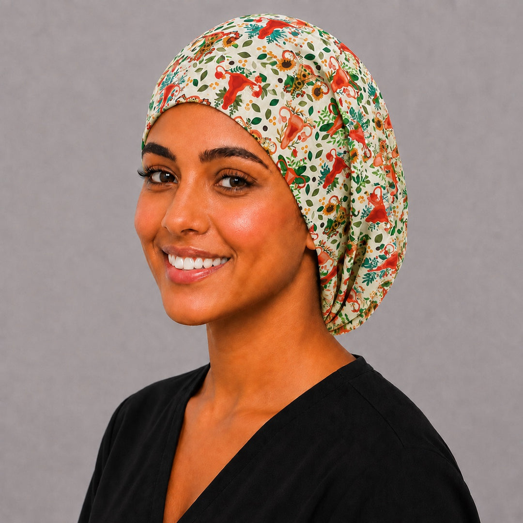 Anatomical uterus Euro surgical hat, right angled smiling view — folk-art floral print, breathable cotton cap handmade in the USA