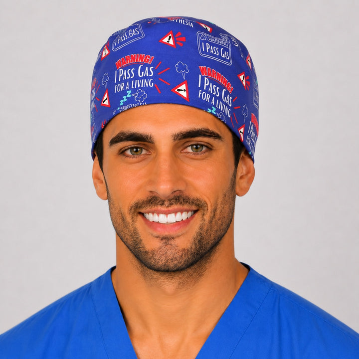 I Pass Gas for a Living anesthesia scrub cap front view — funny royal blue tie-back surgical cap for anesthesiologists and CRNAs