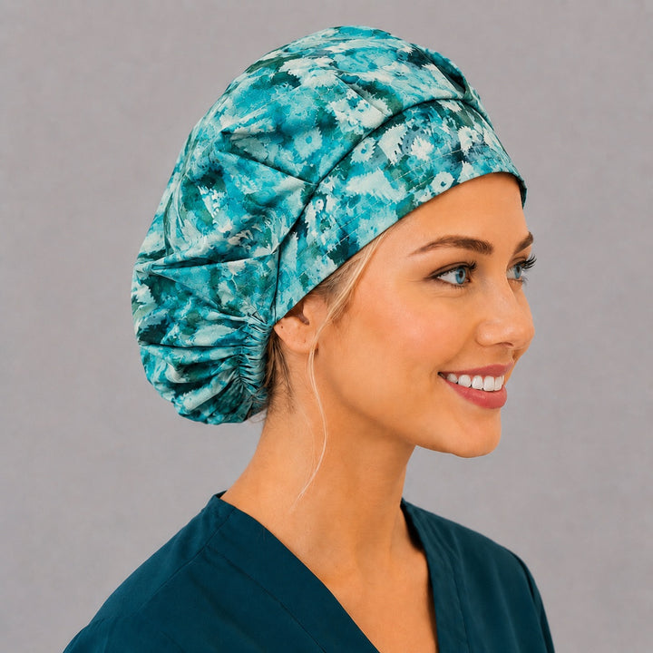 Right side profile of the aqua batik icicle bouffant surgical hat — winter geometric print, roomy breathable cotton cap for nurses